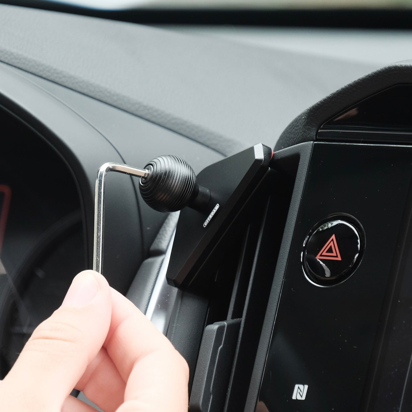 Image of Offroam Mounting Base installed securely in Subaru Crosstrek 2024-2026 | Impreza 2024-2026 | WRX 2022-2026. This premium all metal phone mounting base installs easily without drilling or glue. Perfect placement without blocking screens, driver view, or air flow.