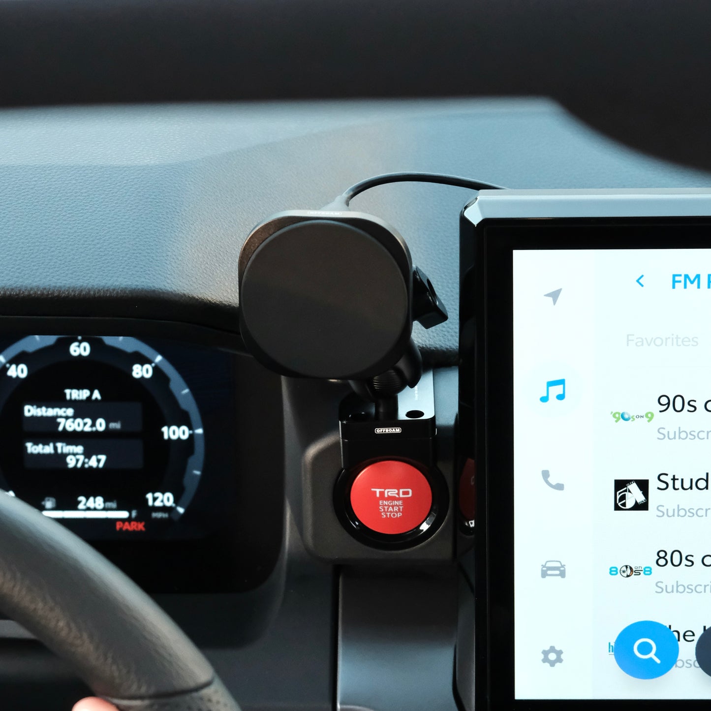 Image of Offroam MagSafe-compatible Phone Mount installed securely in Toyota Tacoma 2024-2026 | 4Runner 2025-2026. This premium phone mount installs easily without drilling or glue. High force magnets hold phone on any trail, road, or track. Perfect placement without blocking screens, driver view, or air flow. Fully adjustable positioning.