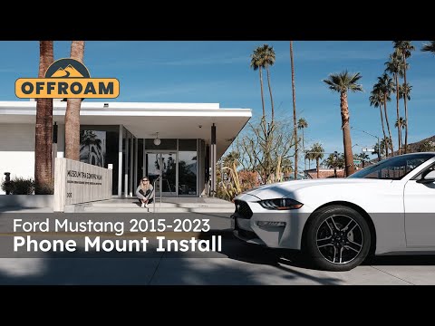 Video of Offroam Phone Mount installation for Ford Mustang 2015-2023. This premium phone mount installs easily without drilling or glue. Spring loaded Universal holder for use with any phone. Perfect placement without blocking screens, driver view, or air flow. Fully adjustable positioning.