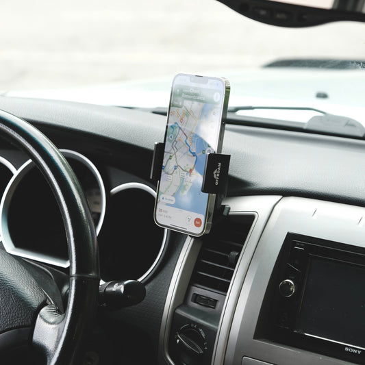 Image of Offroam Phone Mount installed securely in Toyota Tacoma 2005-2011. This premium phone mount installs easily without drilling or glue. Spring loaded Universal holder for use with any phone. Perfect placement without blocking screens, driver view, or air flow. Fully adjustable positioning.