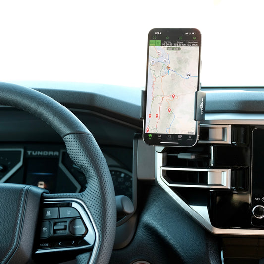 Image of Offroam Phone Mount installed securely in Toyota Tundra 2022-2025 | Sequoia 2023-2025. This premium phone mount installs easily without drilling or glue. Spring loaded Universal holder for use with any phone. Perfect placement without blocking screens, driver view, or air flow. Fully adjustable positioning.