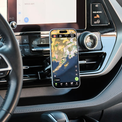 Image of Offroam MagSafe-compatible Phone Mount installed securely in Toyota Highlander 2020-2026. This premium phone mount installs easily without drilling or glue. High force magnets hold phone on any trail, road, or track. Perfect placement without blocking screens, driver view, or air flow. Fully adjustable positioning.