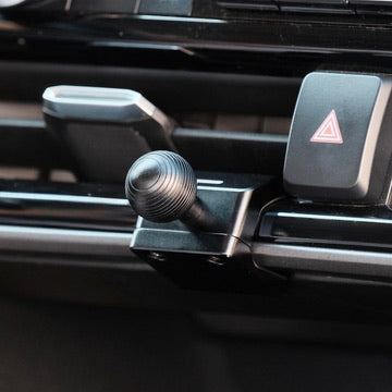 Image of Offroam Mounting Base installed securely in Toyota Highlander 2020-2026. This premium all metal phone mounting base installs easily without drilling or glue. Perfect placement without blocking screens, driver view, or air flow.