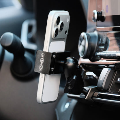 Image of Offroam Phone Mount installed securely in Toyota Highlander 2020-2026. This premium phone mount installs easily without drilling or glue. Spring loaded Universal holder for use with any phone. Perfect placement without blocking screens, driver view, or air flow. Fully adjustable positioning.