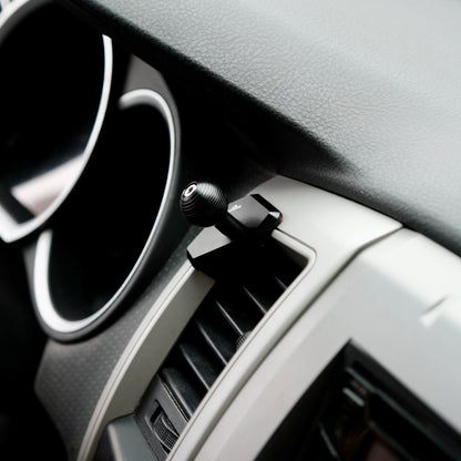 Image of Offroam MagSafe-compatible Phone Mount installed securely in Toyota Tacoma 2005-2011. This premium phone mount installs easily without drilling or glue. High force magnets hold phone on any trail, road, or track. Perfect placement without blocking screens, driver view, or air flow. Fully adjustable positioning.