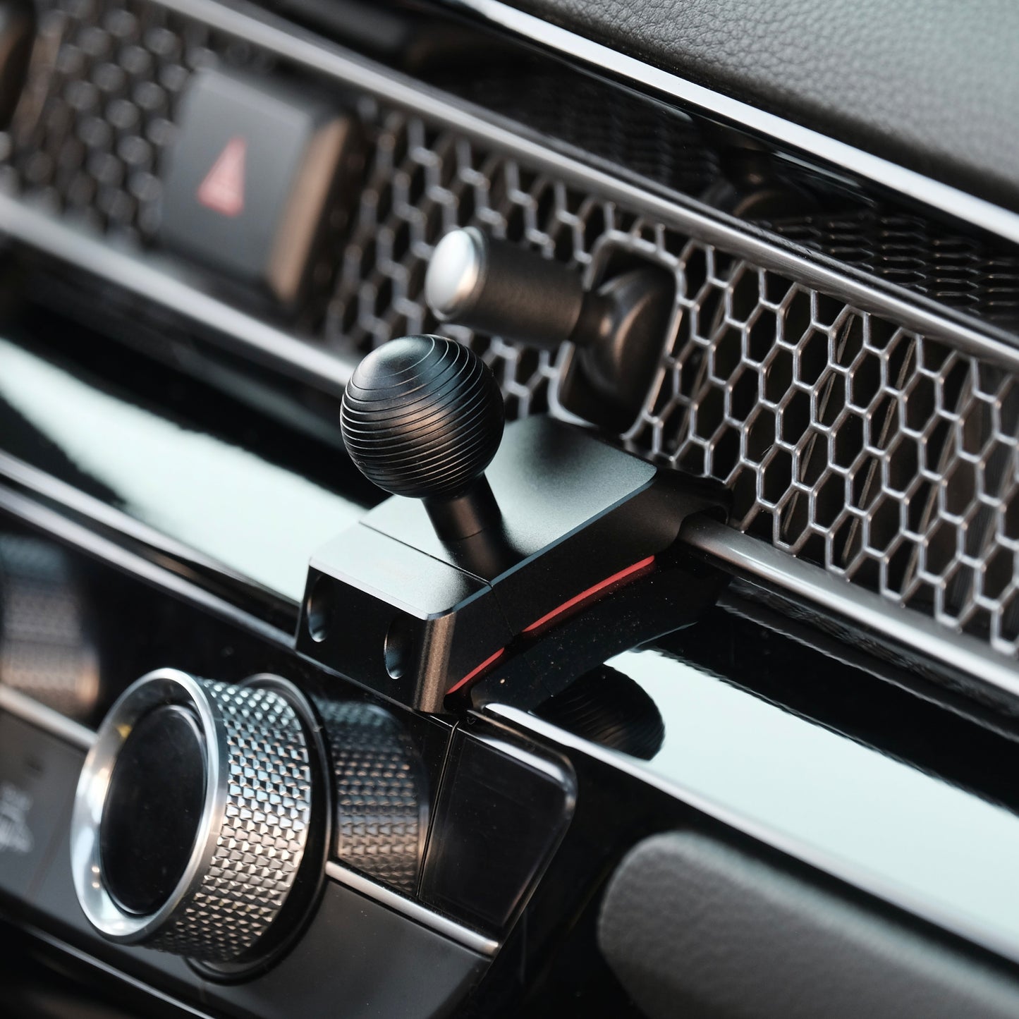 Image of Offroam Mounting Base installed securely in Honda Civic 2022-2025 | CR-V 2023-2025. This premium all metal phone mounting base installs easily without drilling or glue. Perfect placement without blocking screens, driver view, or air flow.