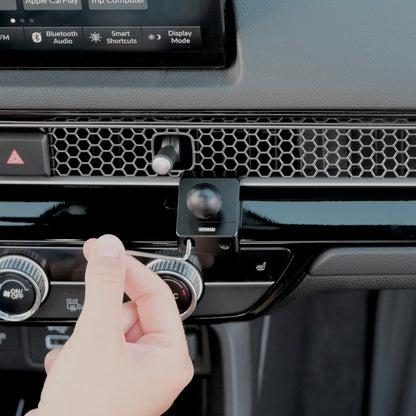 Image of Offroam Mounting Base installed securely in Honda Civic 2022-2025 | CR-V 2023-2025. This premium all metal phone mounting base installs easily without drilling or glue. Perfect placement without blocking screens, driver view, or air flow.
