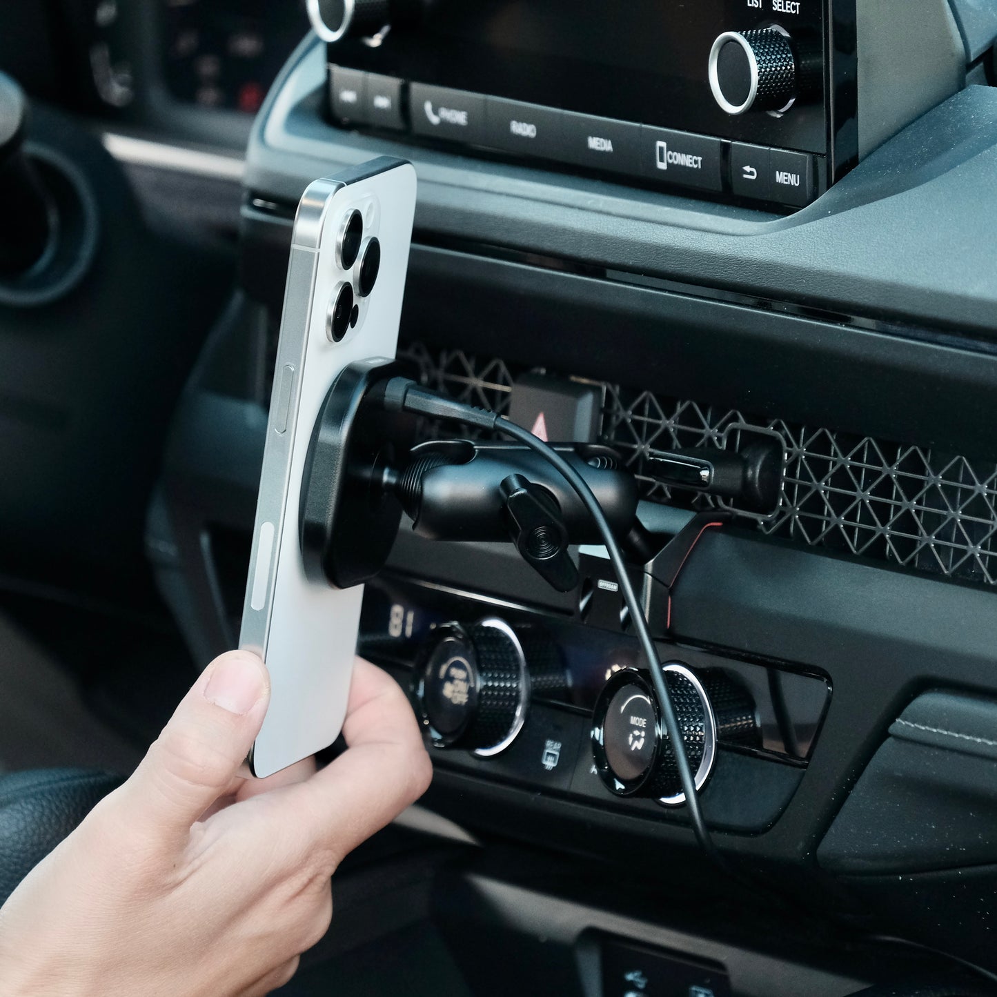 Image of Offroam MagSafe-compatible Phone Mount installed securely in Honda Accord 2023-2026. This premium phone mount installs easily without drilling or glue. High force magnets hold phone on any trail, road, or track. Perfect placement without blocking screens, driver view, or air flow. Fully adjustable positioning.