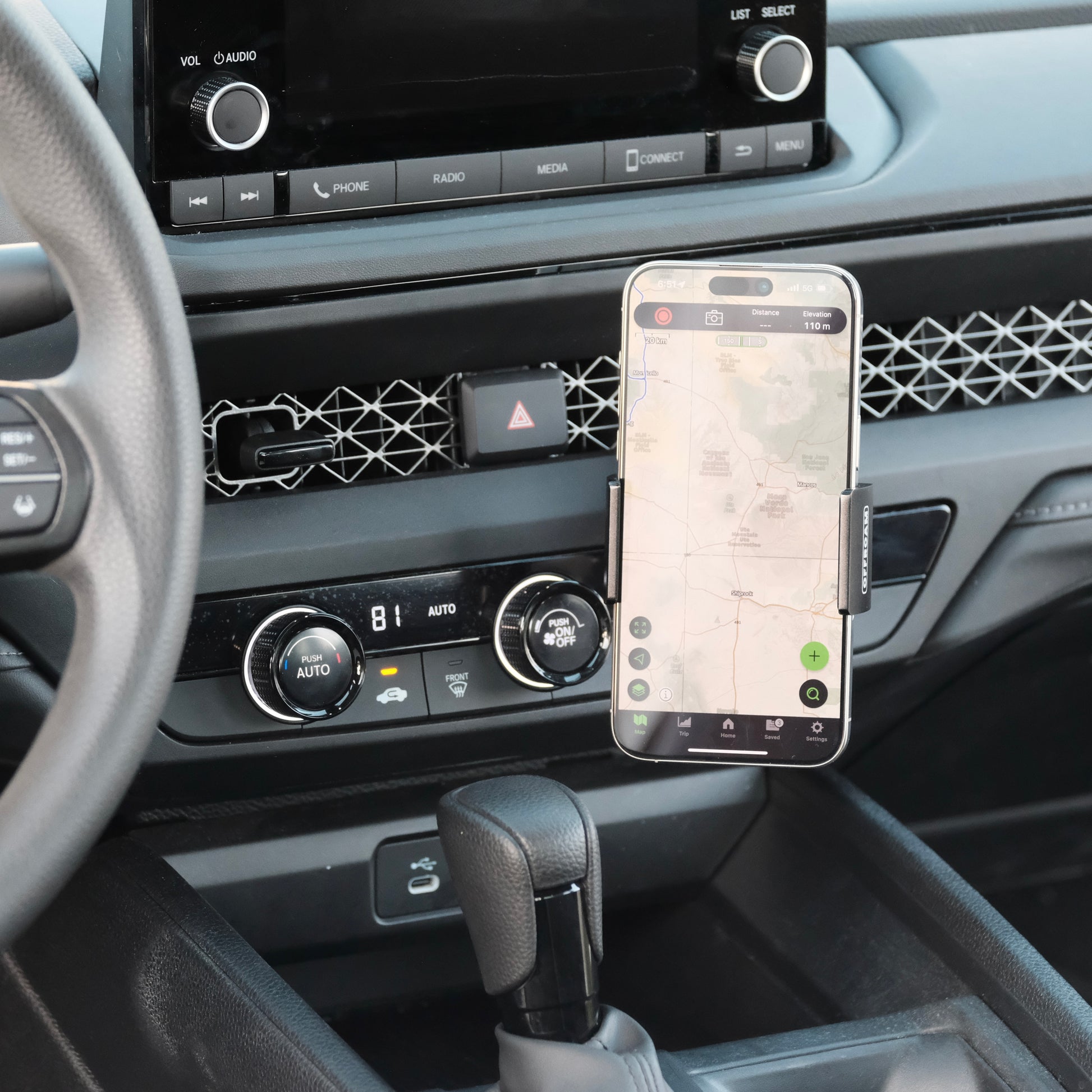 Image of Offroam Phone Mount installed securely in Honda Accord 2023-2026. This premium phone mount installs easily without drilling or glue. Spring loaded Universal holder for use with any phone. Perfect placement without blocking screens, driver view, or air flow. Fully adjustable positioning.