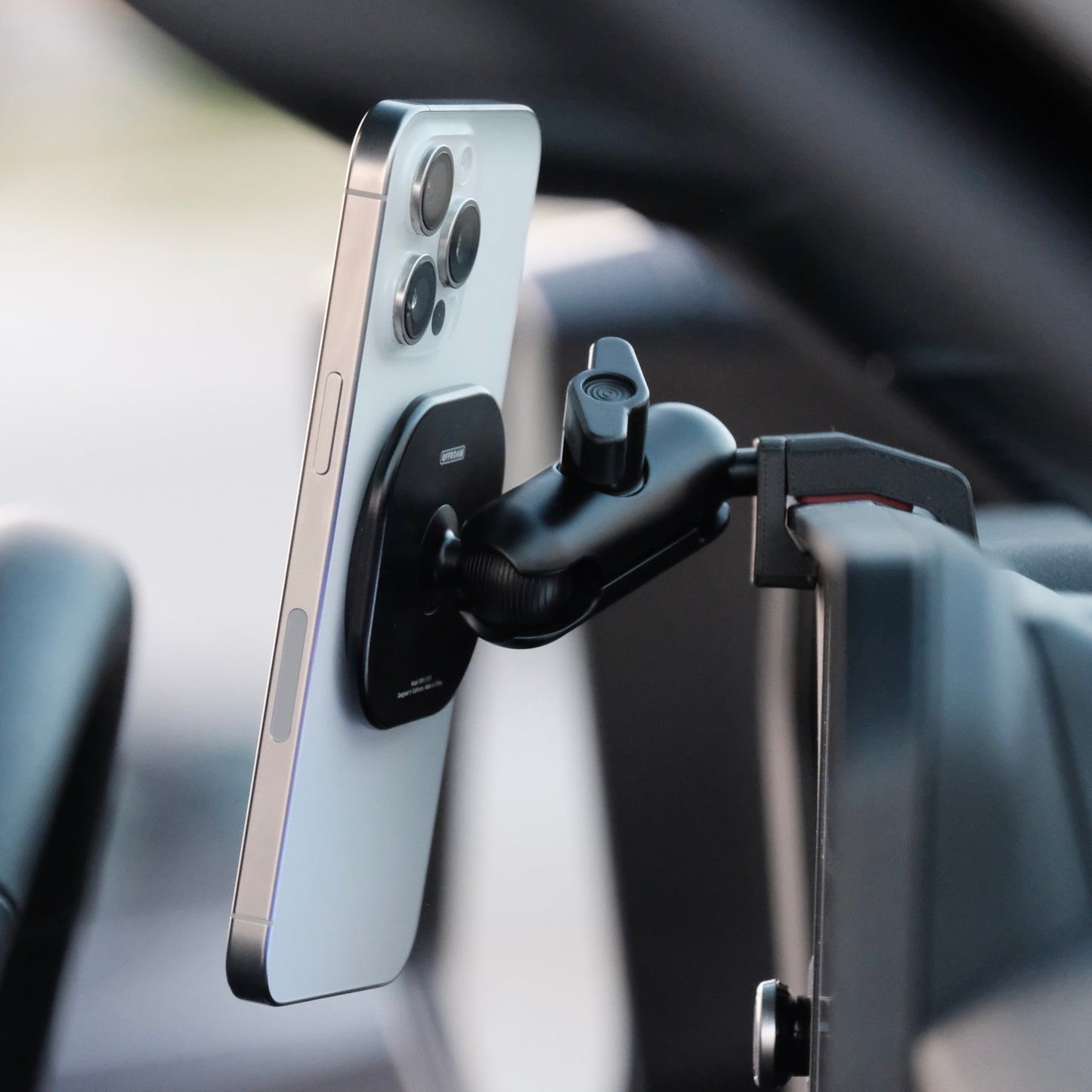 Image of Offroam MagSafe-compatible Phone Mount installed securely in Toyota Land Cruiser 250 2024-2025. This premium phone mount installs easily without drilling or glue. High force magnets hold phone on any trail, road, or track. Perfect placement without blocking screens, driver view, or air flow. Fully adjustable positioning.