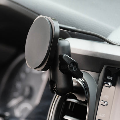 Image of Offroam MagSafe-compatible Phone Mount installed securely in Toyota Tacoma 2016-2023 | Tundra 2014-2021. This premium phone mount installs easily without drilling or glue. High force magnets hold phone on any trail, road, or track. Perfect placement without blocking screens, driver view, or air flow. Fully adjustable positioning.
