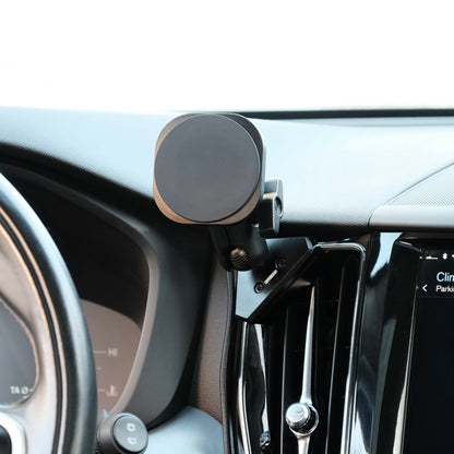 Offroam phone mount attached to the dashboard of Volvo XC60 securely. Featuring a Qi2 charging holder with powerful magnets for secure hold