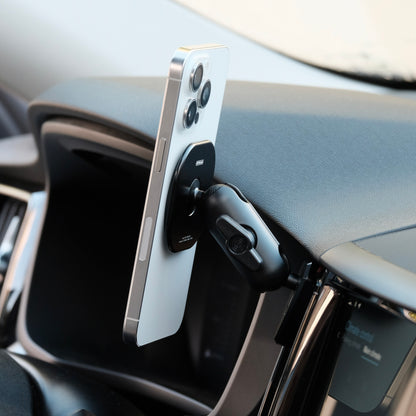 Offroam non-charging magsafe phone mount installed on Volvo XC60 2018-2026 models. Shown holding iPhone securely with MagSafe magnets and articulating arm.