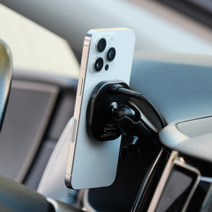 Offroam phone mount installed on Volvo XC60 2018-2026 models with Qi2 charging holder. Shown holding iPhone securely with MagSafe magnets and articulating arm.