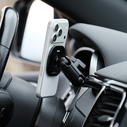 Image of Offroam MagSafe-compatible Phone Mount installed securely in Jeep Grand Cherokee WK2 2014-2022. This premium phone mount installs easily without drilling or glue. High force magnets hold phone on any trail, road, or track. Perfect placement without blocking screens, driver view, or air flow. Fully adjustable positioning.