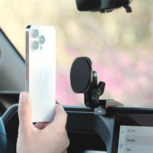 Image of Offroam MagSafe-compatible Phone Mount installed securely in Toyota Land Cruiser 250 2024-2025. This premium phone mount installs easily without drilling or glue. High force magnets hold phone on any trail, road, or track. Perfect placement without blocking screens, driver view, or air flow. Fully adjustable positioning.