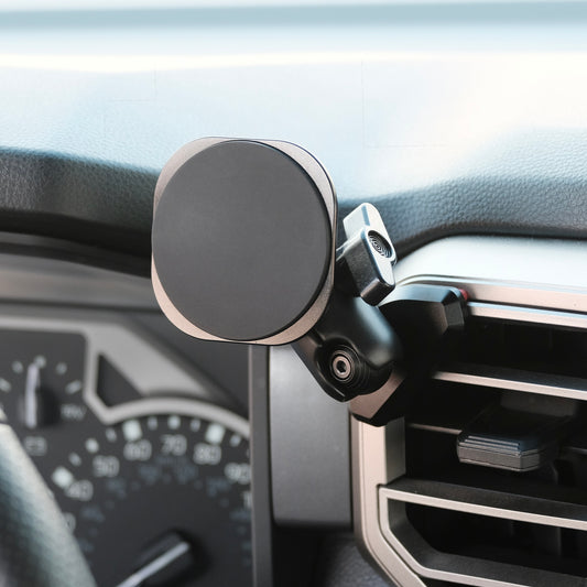 Image of Offroam MagSafe-compatible Phone Mount installed securely in Toyota Tundra 2022-2026 | Sequoia 2023-2026. This premium phone mount installs easily without drilling or glue. High force magnets hold phone on any trail, road, or track. Perfect placement without blocking screens, driver view, or air flow. Fully adjustable positioning.