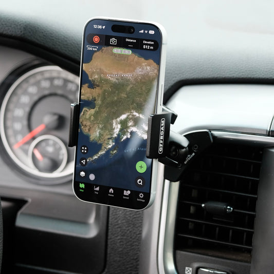 Image of Offroam Phone Mount installed securely in Ram 1500/2500/3500 2013-2018 & Ram Classic 2019-2024. This premium phone mount installs easily without drilling or glue. Spring loaded Universal holder for use with any phone. Perfect placement without blocking screens, driver view, or air flow. Fully adjustable positioning.