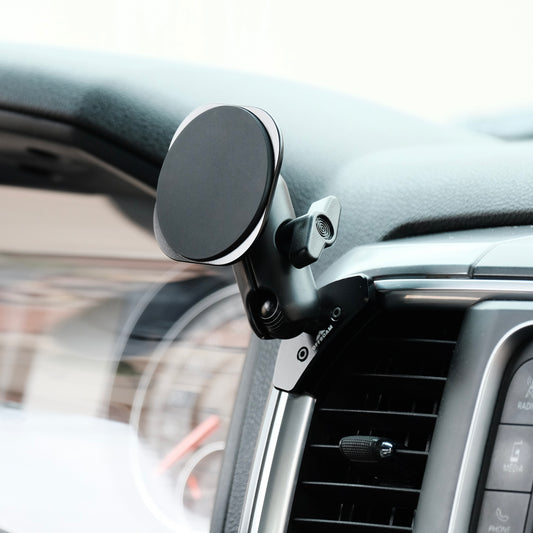 Image of Offroam MagSafe-compatible Phone Mount installed securely in Ram 1500/2500/3500 2013-2018 & 1500 Classic 2019-2024. This premium phone mount installs easily without drilling or glue. High force magnets hold phone on any trail, road, or track. Perfect placement without blocking screens, driver view, or air flow. Fully adjustable positioning.