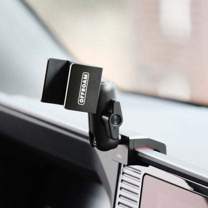 Image of Offroam Phone Mount installed securely in Toyota Land Cruiser 250 2024-2025. This premium phone mount installs easily without drilling or glue. Spring loaded Universal holder for use with any phone. Perfect placement without blocking screens, driver view, or air flow. Fully adjustable positioning.