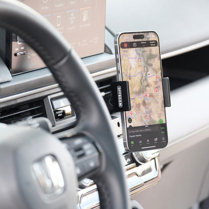 Image of Offroam Phone Mount installed securely in Honda Pilot 2023-2026 | Passport 2026. This premium phone mount installs easily without drilling or glue. Spring loaded Universal holder for use with any phone. Perfect placement without blocking screens, driver view, or air flow. Fully adjustable positioning.