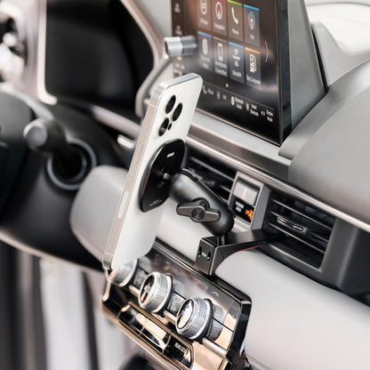 Image of Offroam MagSafe-compatible Phone Mount installed securely in Honda Pilot 2023-2025 | Passport 2026. This premium phone mount installs easily without drilling or glue. High force magnets hold phone on any trail, road, or track. Perfect placement without blocking screens, driver view, or air flow. Fully adjustable positioning.