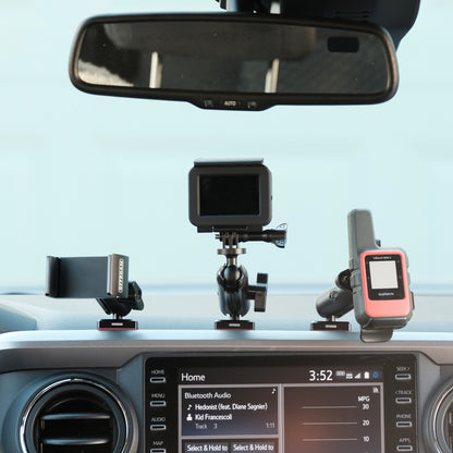 Image of Offroam Phone Mounts installed securely in Toyota Tacoma 2016-2023. This premium phone mount installs easily without drilling or glue. Spring loaded Universal holder for use with any phone. Perfect placement without blocking screens, driver view, or air flow. Fully adjustable positioning.