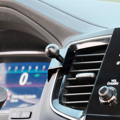 Image of Offroam Mounting Base installed securely in Honda Ridgeline 2016-2026 | Passport 2019-2025 | Pilot 2016-2022. This premium all metal phone mounting base installs easily without drilling or glue. Perfect placement without blocking screens, driver view, or air flow.
