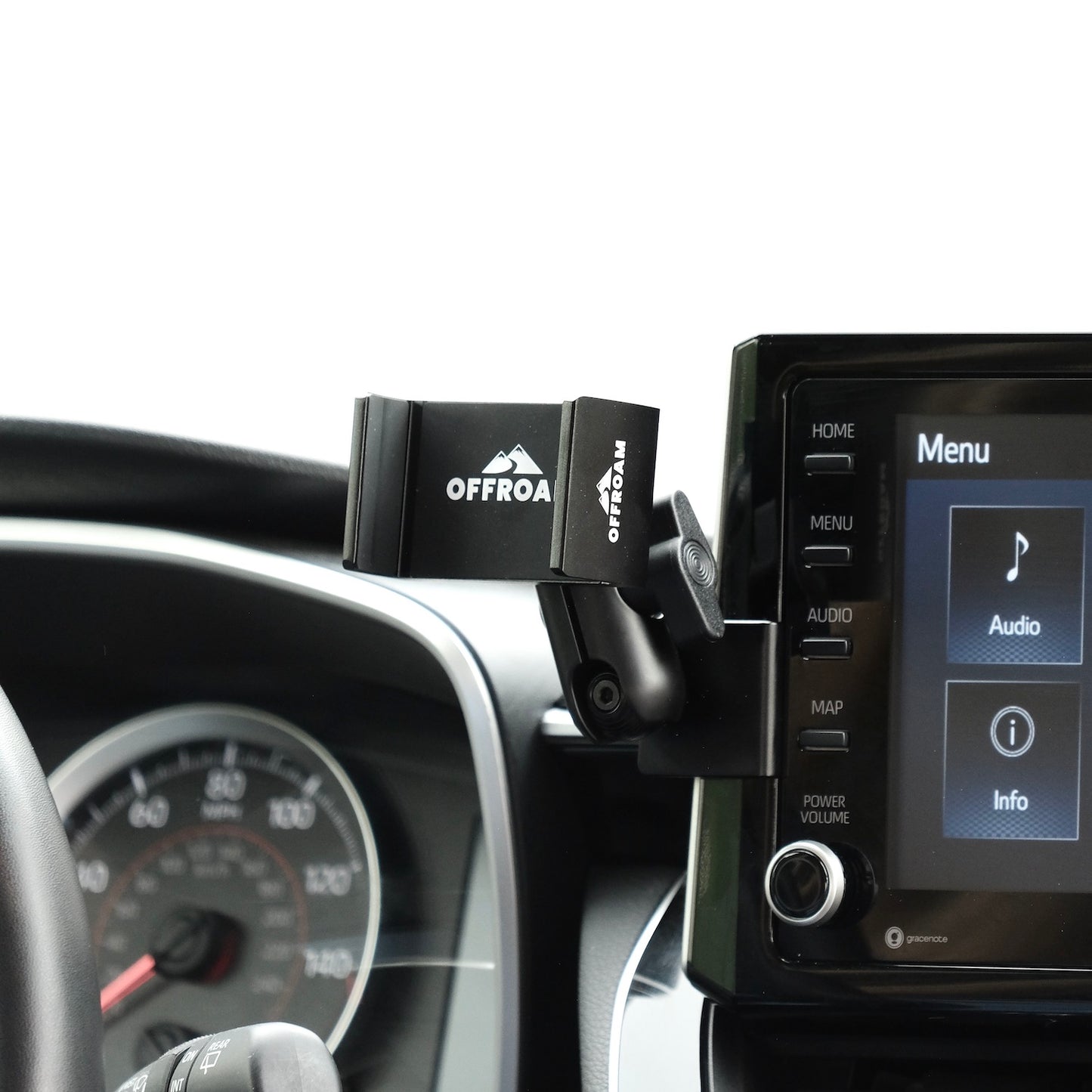 Image of Offroam Phone Mount installed securely in Toyota Corolla 2020-2026 | Corolla Cross 2022-2026. This premium phone mount installs easily without drilling or glue. Spring loaded Universal holder for use with any phone. Perfect placement without blocking screens, driver view, or air flow. Fully adjustable positioning.