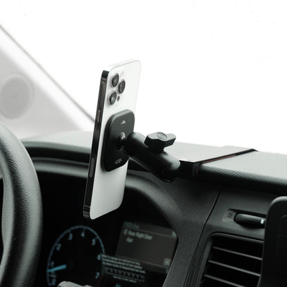 Image of Offroam MagSafe-compatible Phone Mount installed securely in Ford Transit 2020-2026. This premium phone mount installs easily without drilling or glue. High force magnets hold phone on any trail, road, or track. Perfect placement without blocking screens, driver view, or air flow. Fully adjustable positioning.