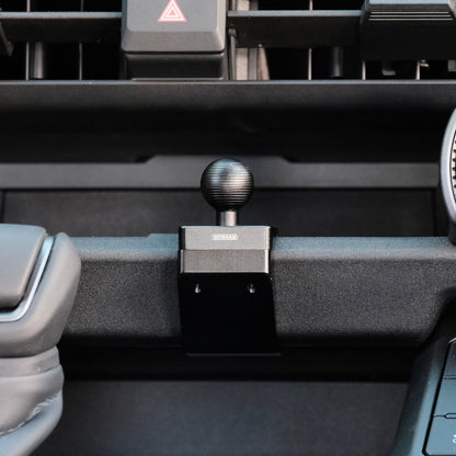 Image of Offroam Mounting Base installed securely in Toyota RAV4 2026, Center Console. This premium all metal phone mounting base installs easily without drilling or glue. Perfect placement without blocking screens, driver view, or air flow.