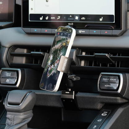 Image of Offroam Phone Mount installed securely in Toyota RAV4 2026. This premium phone mount installs easily without drilling or glue. Spring loaded Universal holder for use with any phone. Perfect placement without blocking screens, driver view, or air flow. Fully adjustable positioning.