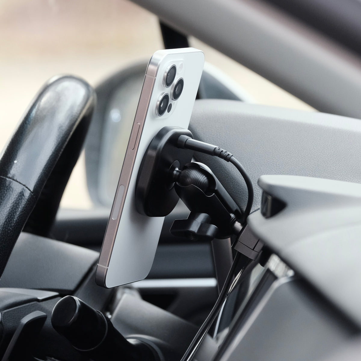 Image of Offroam MagSafe-compatible Phone Mount installed securely in Subaru Outback | Legacy 2020-2025. This premium phone mount installs easily without drilling or glue. High force magnets hold phone on any trail, road, or track. Perfect placement without blocking screens, driver view, or air flow. Fully adjustable positioning.