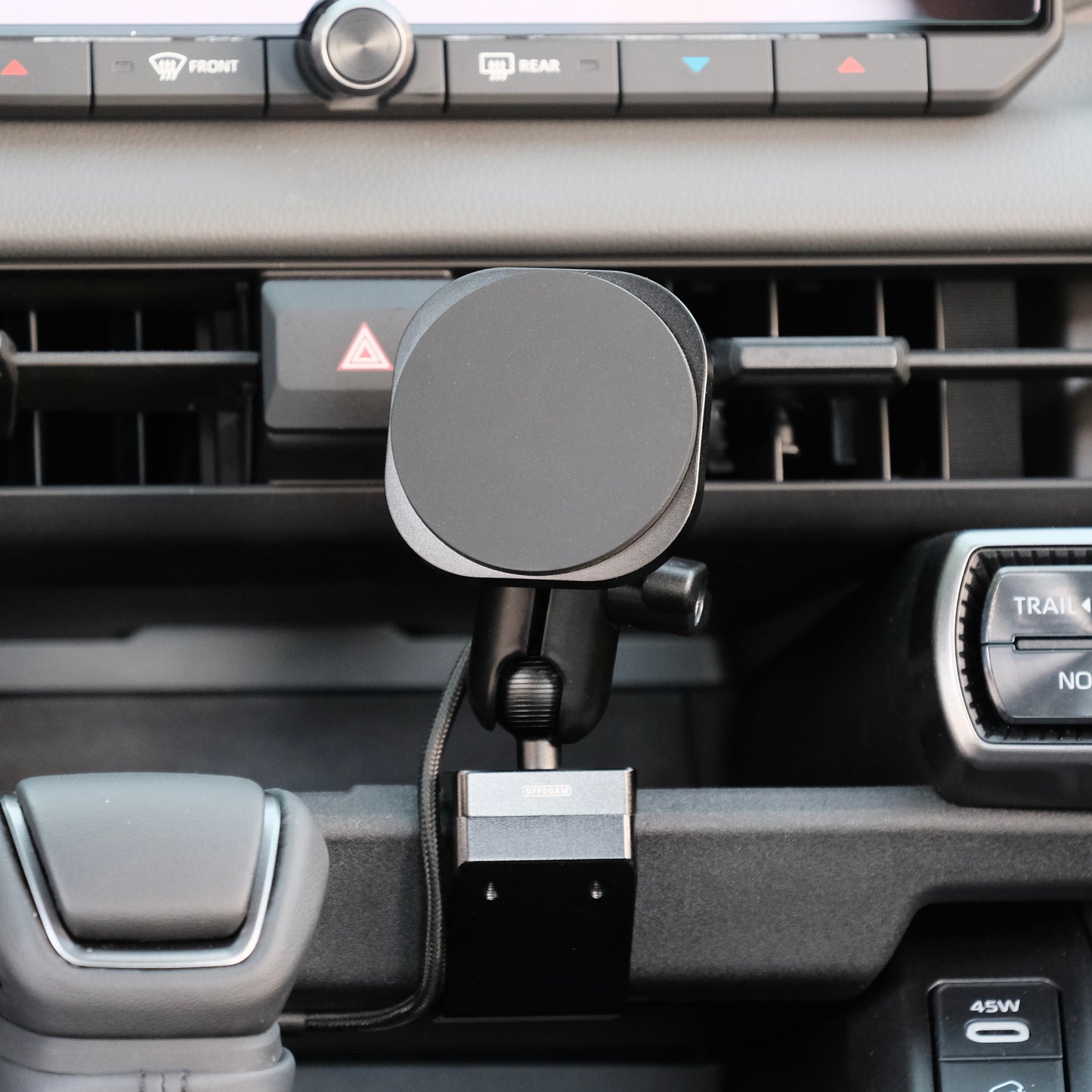 Image of Offroam MagSafe-compatible Phone Mount installed securely in Toyota RAV4 2026. This premium phone mount installs easily without drilling or glue. High force magnets hold phone on any trail, road, or track. Perfect placement without blocking screens, driver view, or air flow. Fully adjustable positioning.