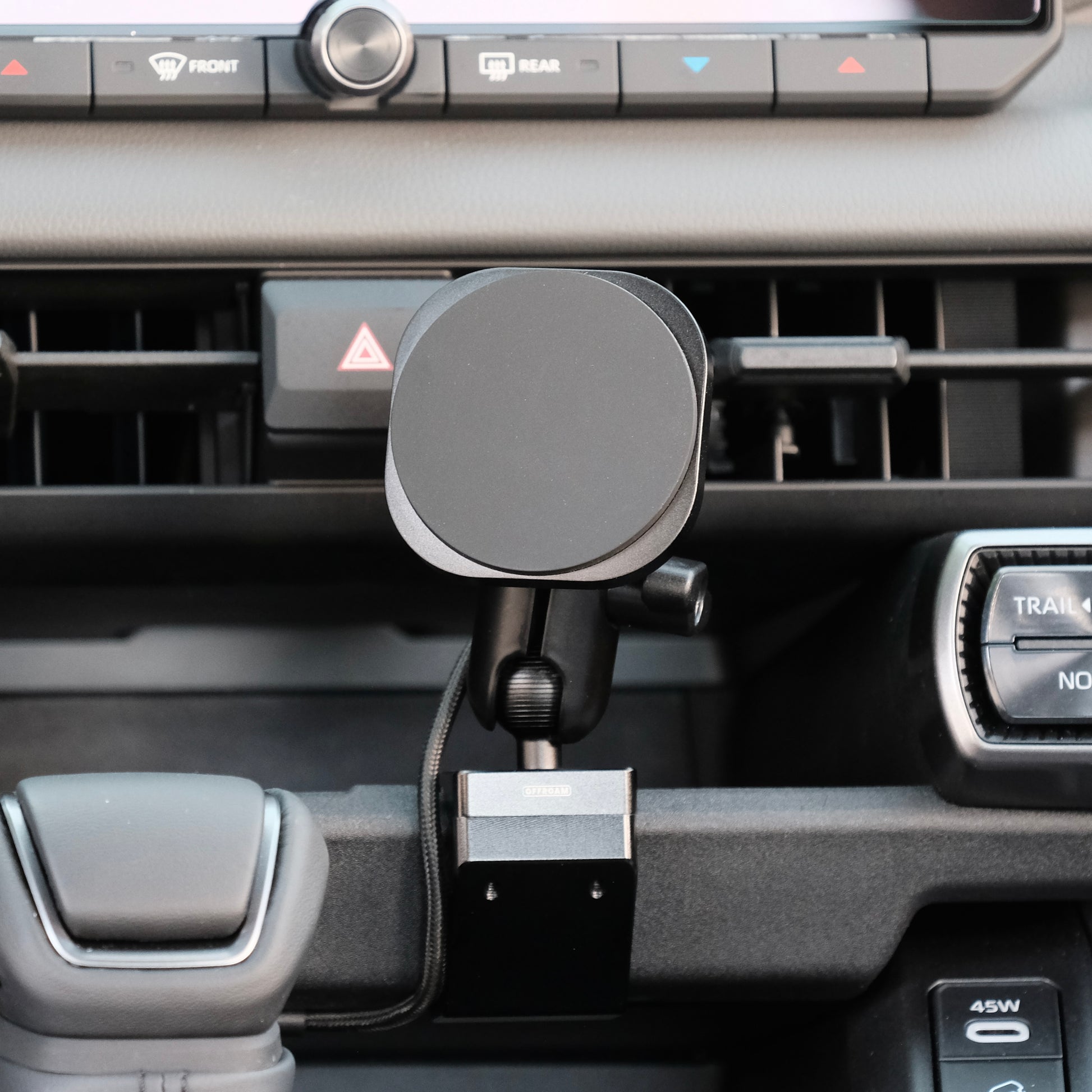 Image of Offroam MagSafe-compatible Phone Mount installed securely in Toyota RAV4 2026. This premium phone mount installs easily without drilling or glue. High force magnets hold phone on any trail, road, or track. Perfect placement without blocking screens, driver view, or air flow. Fully adjustable positioning.