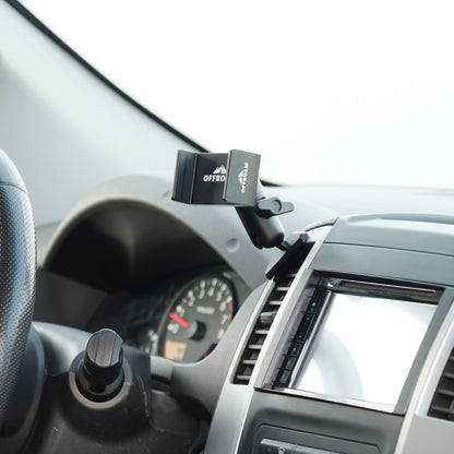 Image of Offroam Phone Mount installed securely in Nissan Frontier 2009-2021 | Xterra 2009-2015. This premium phone mount installs easily without drilling or glue. Spring loaded Universal holder for use with any phone. Perfect placement without blocking screens, driver view, or air flow. Fully adjustable positioning.