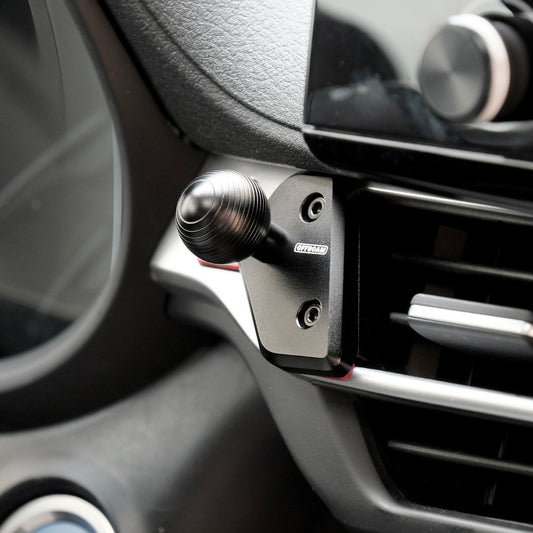 Image of Offroam Mounting Base installed securely in Toyota Sienna 2021-2026. This premium all metal phone mounting base installs easily without drilling or glue. Perfect placement without blocking screens, driver view, or air flow.