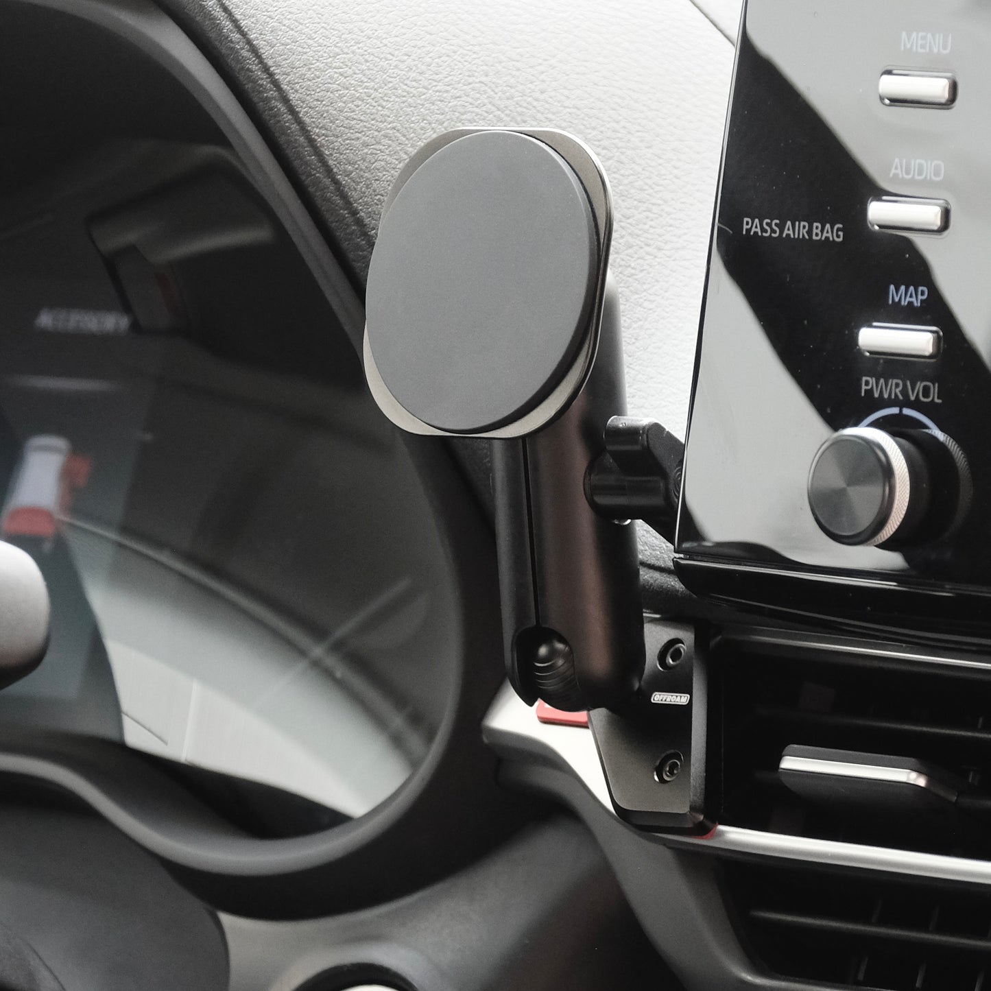 Image of Offroam MagSafe-compatible Phone Mount installed securely in Toyota Sienna 2021-2026. This premium phone mount installs easily without drilling or glue. High force magnets hold phone on any trail, road, or track. Perfect placement without blocking screens, driver view, or air flow. Fully adjustable positioning.