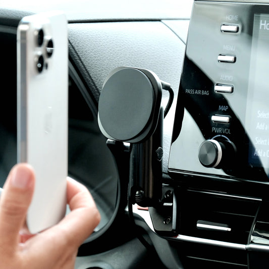 Image of Offroam MagSafe-compatible Phone Mount installed securely in Toyota Sienna 2021-2026. This premium phone mount installs easily without drilling or glue. High force magnets hold phone on any trail, road, or track. Perfect placement without blocking screens, driver view, or air flow. Fully adjustable positioning.
