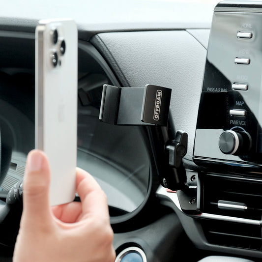 Image of Offroam Phone Mount installed securely in Toyota Sienna 2021-2026. This premium phone mount installs easily without drilling or glue. Spring loaded Universal holder for use with any phone. Perfect placement without blocking screens, driver view, or air flow. Fully adjustable positioning.