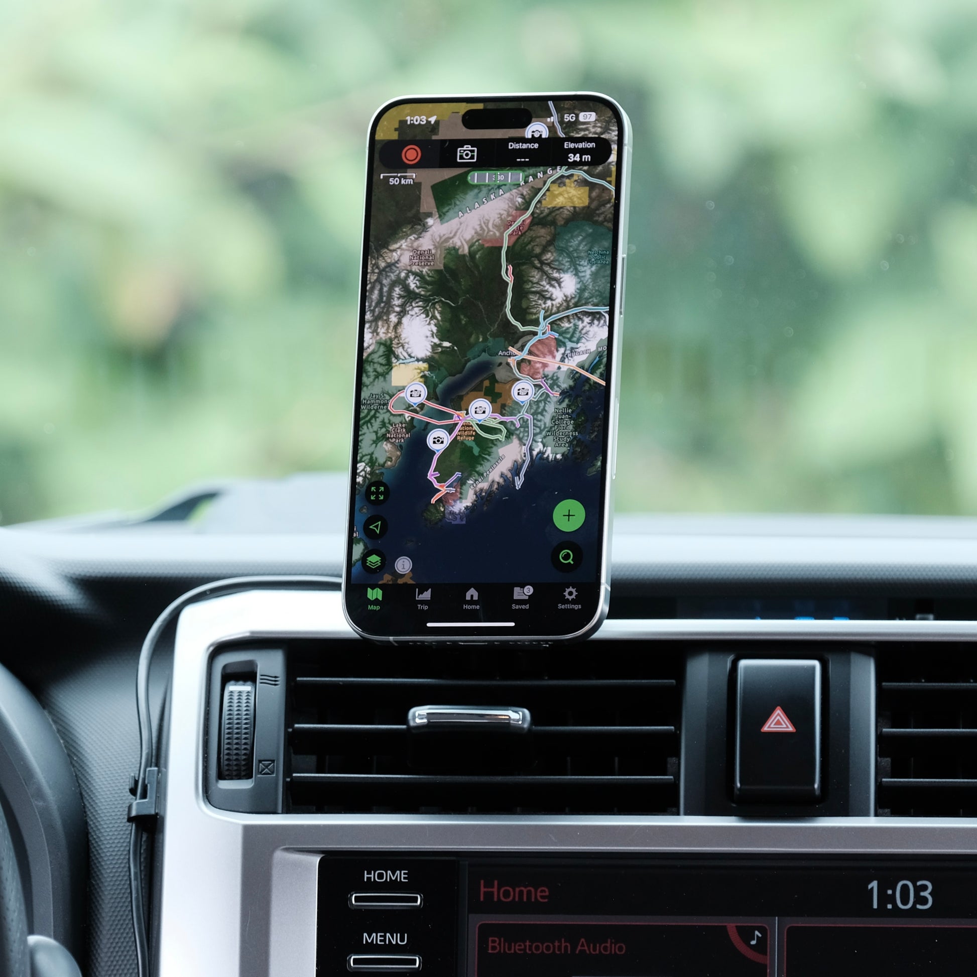 Image of Offroam MagSafe-compatible Phone Mount installed securely in Toyota 4Runner 2010-2024. This premium phone mount installs easily without drilling or glue. High force magnets hold phone on any trail, road, or track. Perfect placement without blocking screens, driver view, or air flow. Fully adjustable positioning.