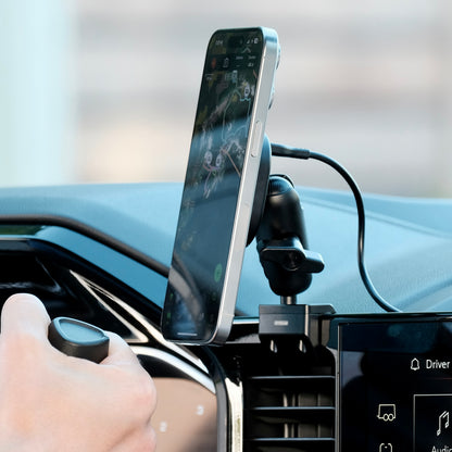 Image of Offroam MagSafe-compatible Phone Mount installed securely in Chevrolet Silverado 2022-2025 | Silverado HD 2024-2025 | GMC Sierra 1500 2022-2025 | Sierra HD 2024-2025 with 13.4-in. display. This premium phone mount installs easily without drilling or glue. High force magnets hold phone on any trail, road, or track. Perfect placement without blocking screens, driver view, or air flow. Fully adjustable positioning.