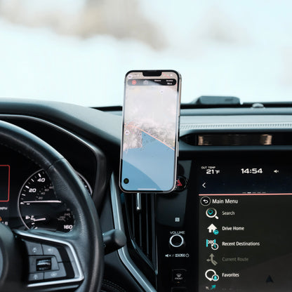 Image of Offroam MagSafe-compatible Phone Mount installed securely in Subaru Outback | Legacy 2020-2025. This premium phone mount installs easily without drilling or glue. High force magnets hold phone on any trail, road, or track. Perfect placement without blocking screens, driver view, or air flow. Fully adjustable positioning.