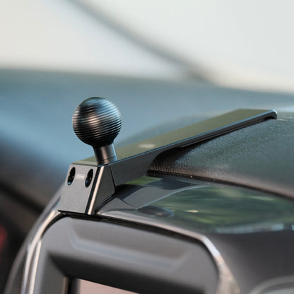 Image of Offroam Mounting Base installed securely in Chevrolet Silverado 2019-2026 | Silverado HD 2020-2026 & GMC Sierra 1500 2019-2026 | Sierra HD 2020-2026 with 7-in.|8-in. display. This premium all metal phone mounting base installs easily without drilling or glue. Perfect placement without blocking screens, driver view, or air flow.