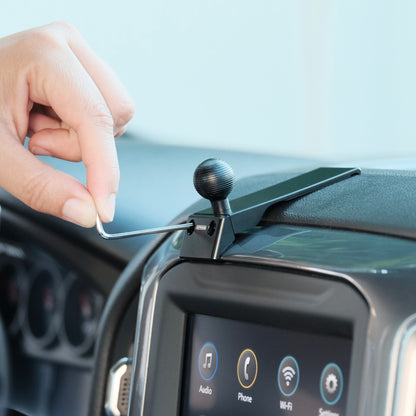 Image of Offroam Mounting Base installation for Chevrolet Silverado 2019-2026 | Silverado HD 2020-2026 & GMC Sierra 1500 2019-2026 | Sierra HD 2020-2026 with 7-in.|8-in. display. This premium all metal phone mounting base installs easily without drilling or glue. Perfect placement without blocking screens, driver view, or air flow.