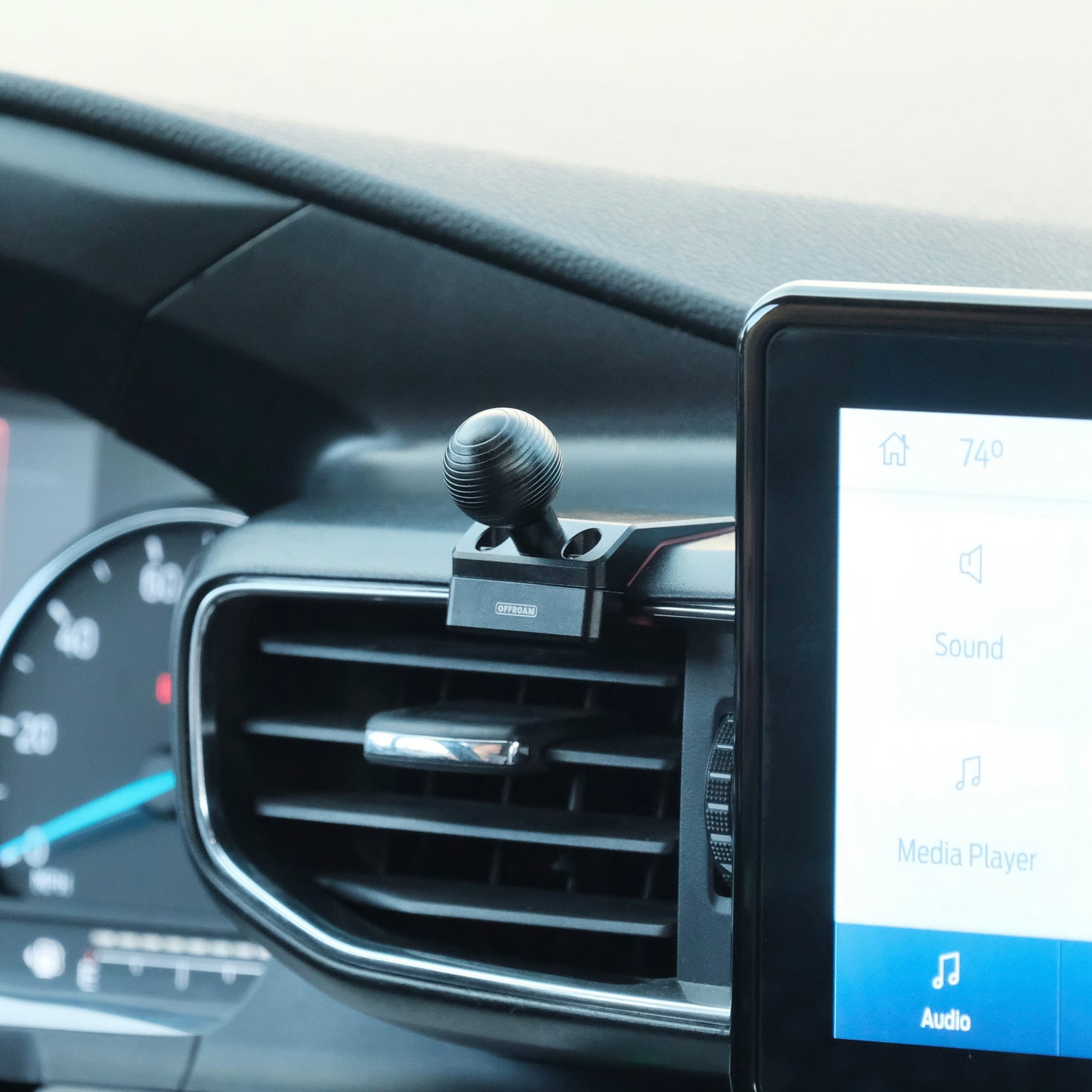 Image of Offroam Mounting Base installed securely in Ford Explorer 2020-2024. This premium all metal phone mounting base installs easily without drilling or glue. Perfect placement without blocking screens, driver view, or air flow.