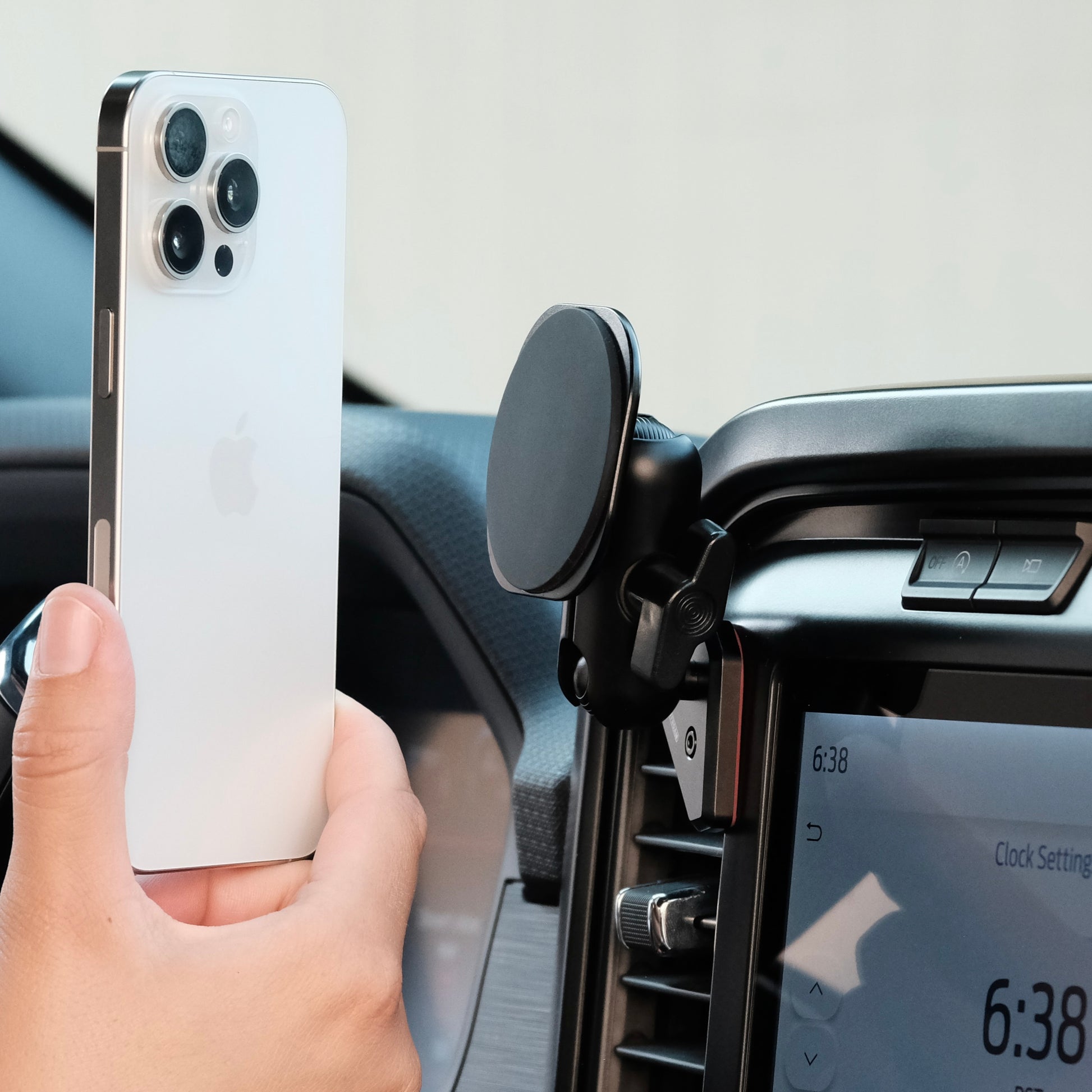 Image of Offroam MagSafe-compatible Phone Mount installed securely in Ford F-150 2021-2025 | F-250/F-350 2023-2025 | F-150 Lightning (XL & PRO) 2022-2025. This premium phone mount installs easily without drilling or glue. High force magnets hold phone on any trail, road, or track. Perfect placement without blocking screens, driver view, or air flow. Fully adjustable positioning.