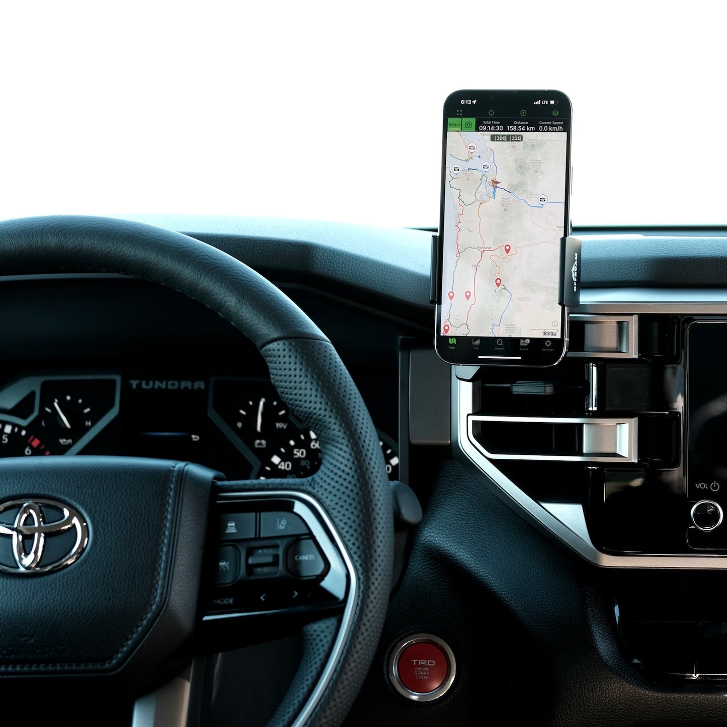Image of Offroam Phone Mount installed securely in Toyota Tundra 2022-2026 | Sequoia 2023-2026. This premium phone mount installs easily without drilling or glue. Spring loaded Universal holder for use with any phone. Perfect placement without blocking screens, driver view, or air flow. Fully adjustable positioning.