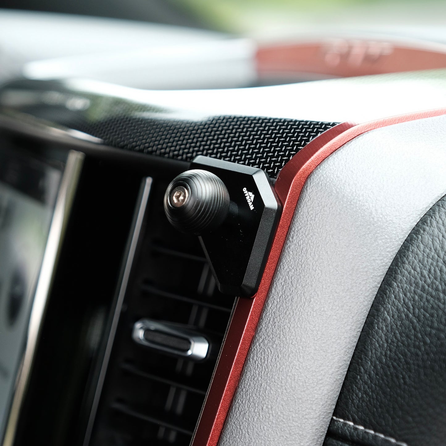 Image of Offroam Mounting Base installed securely in Ram 1500/2500/3500 2019-2026. This premium all metal phone mounting base installs easily without drilling or glue. Perfect placement without blocking screens, driver view, or air flow.