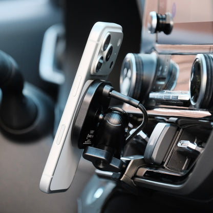 Image of Offroam MagSafe-compatible Phone Mount installed securely in Toyota Highlander 2020-2026. This premium phone mount installs easily without drilling or glue. High force magnets hold phone on any trail, road, or track. Perfect placement without blocking screens, driver view, or air flow. Fully adjustable positioning.
